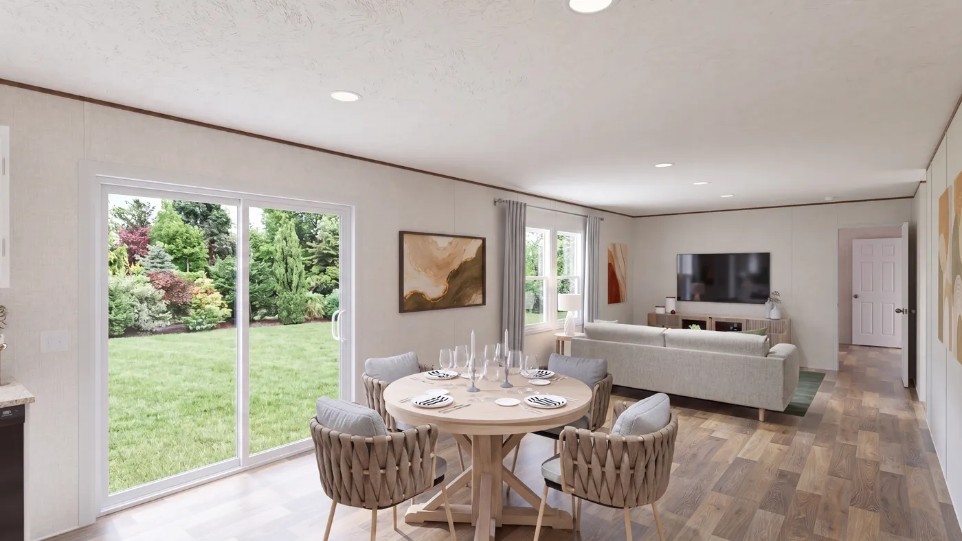 The SYCAMORE Dining Area. This Manufactured Mobile Home features 4 bedrooms and 2 baths.