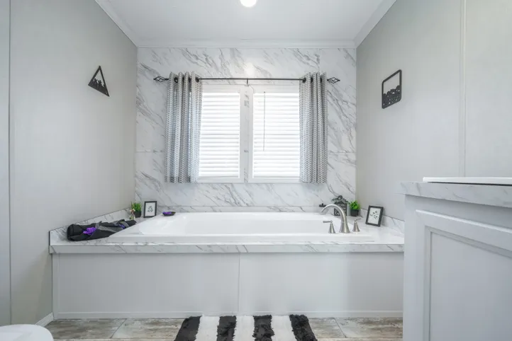 The STELLA Primary Bathroom. This Manufactured Mobile Home features 3 bedrooms and 2 baths.