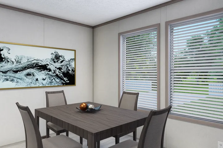 The 5228-E774P THE PULSE Dining Room. This Manufactured Mobile Home features 3 bedrooms and 2 baths.
