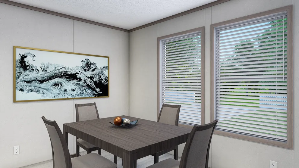The 5228-E774P THE PULSE Dining Room. This Manufactured Mobile Home features 3 bedrooms and 2 baths.