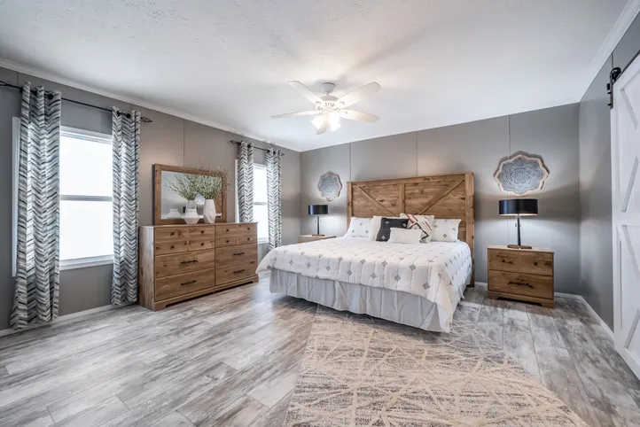 The CASCADE Primary Bedroom. This Manufactured Mobile Home features 4 bedrooms and 2 baths.