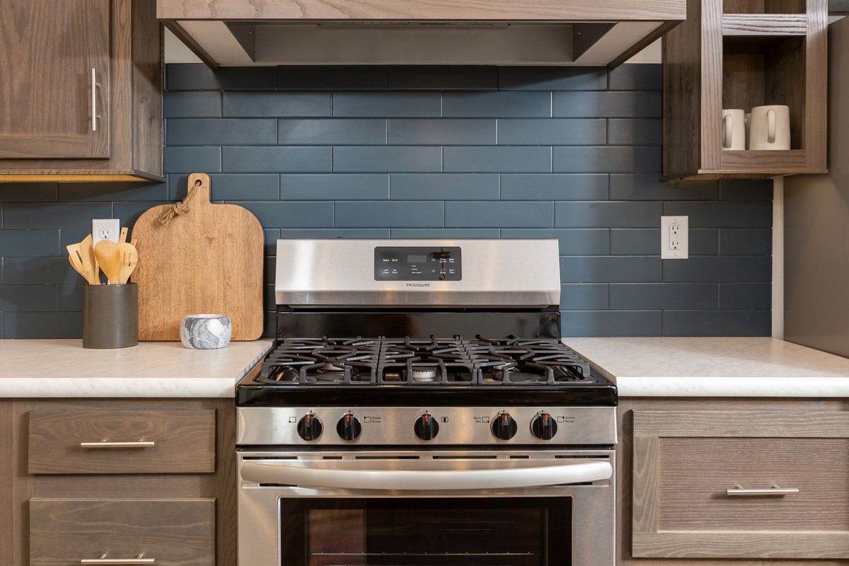 The LEGEND 86 Kitchen. This Manufactured Mobile Home features 3 bedrooms and 2 baths.