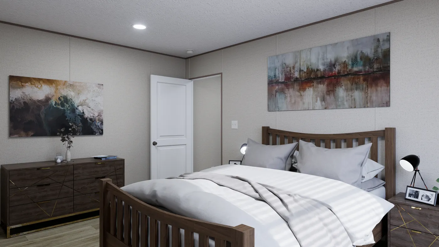 The FOOTHILLS 56 Primary Bedroom. This Manufactured Mobile Home features 2 bedrooms and 2 baths.
