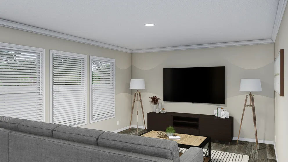 The CAROLINIAN M5010 Family Room. This Manufactured Mobile Home features 3 bedrooms and 2 baths.