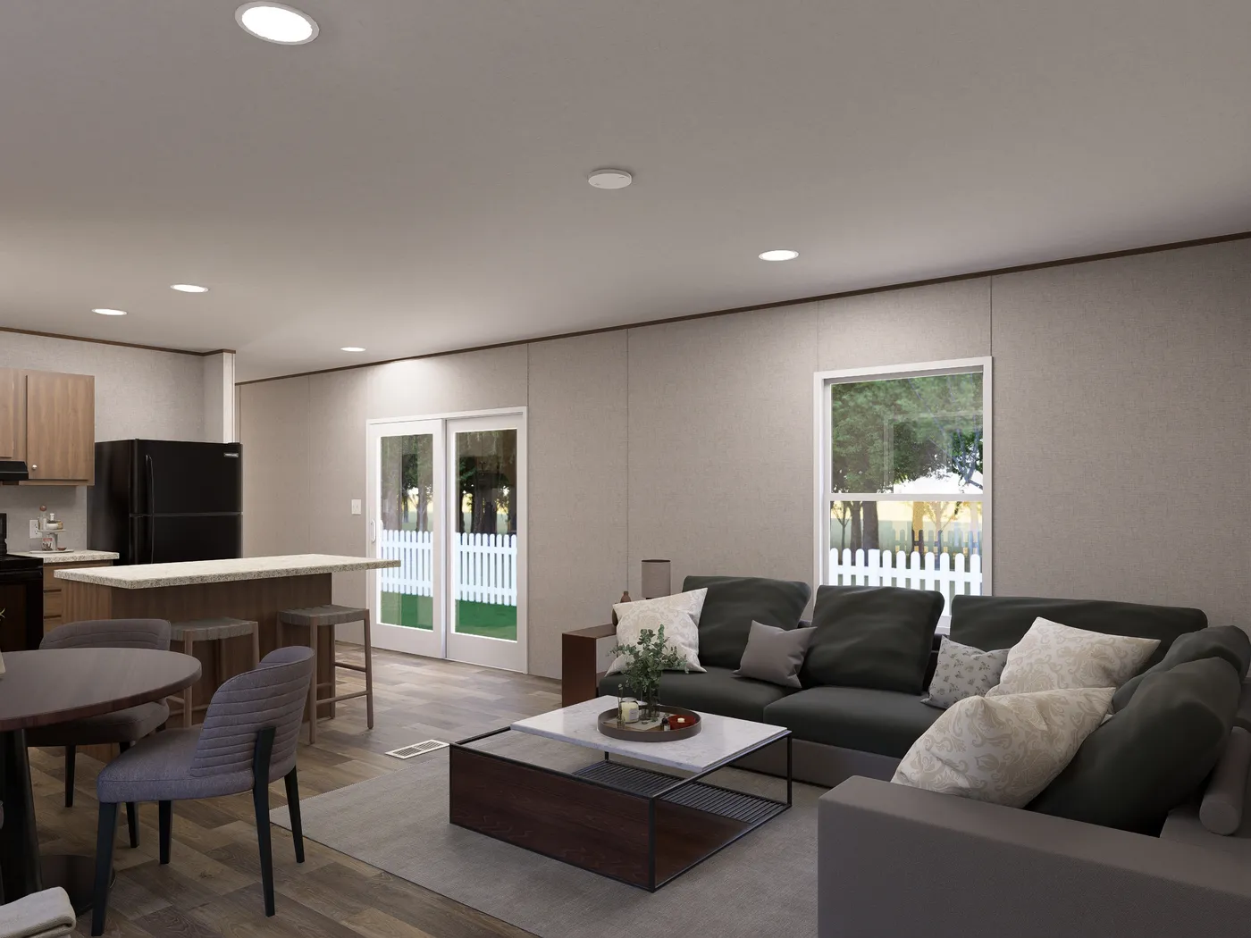 The ASPEN Living Room. This Manufactured Mobile Home features 3 bedrooms and 2 baths.