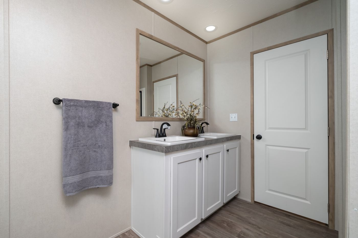 The PT 78 Primary Bathroom. This Manufactured Mobile Home features 3 bedrooms and 2 baths.