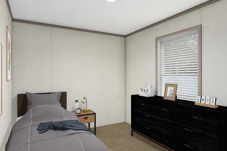 The 4828-E746 THE PULSE Guest Bedroom. This Manufactured Mobile Home features 3 bedrooms and 2 baths.