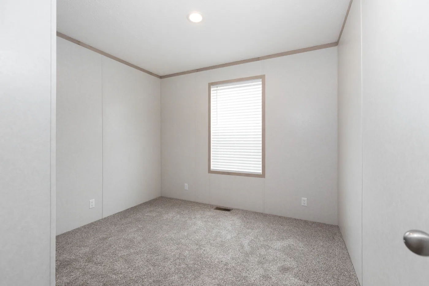 The 7616-4200 ADRENALINE Guest Bedroom. This Manufactured Mobile Home features 3 bedrooms and 2 baths.