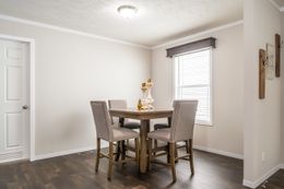 The MAVERICK 56A Dining Area. This Manufactured Mobile Home features 3 bedrooms and 2 baths.