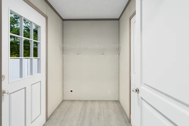 The 5628-E787 THE PULSE Utility Room. This Manufactured Mobile Home features 3 bedrooms and 2 baths.