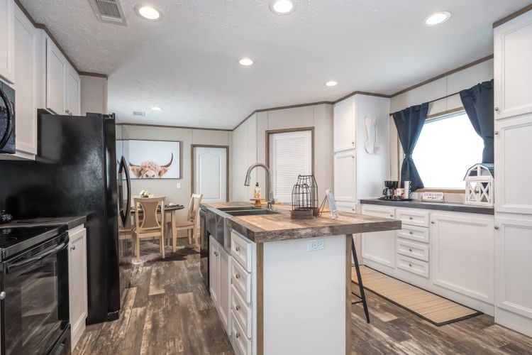 The RIVERHAVEN Kitchen. This Manufactured Mobile Home features 3 bedrooms and 2 baths.