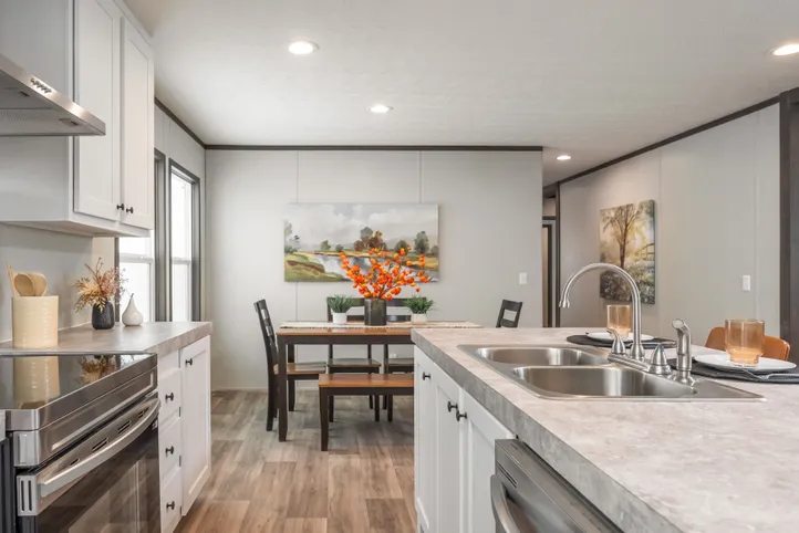 The EMPOWER Kitchen. This Manufactured Mobile Home features 4 bedrooms and 2 baths.