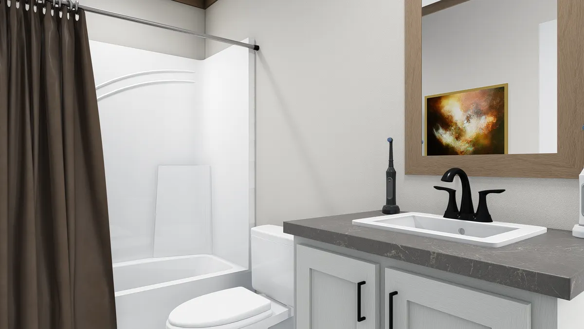 The ANNIE Guest Bathroom. This Manufactured Mobile Home features 3 bedrooms and 2 baths.