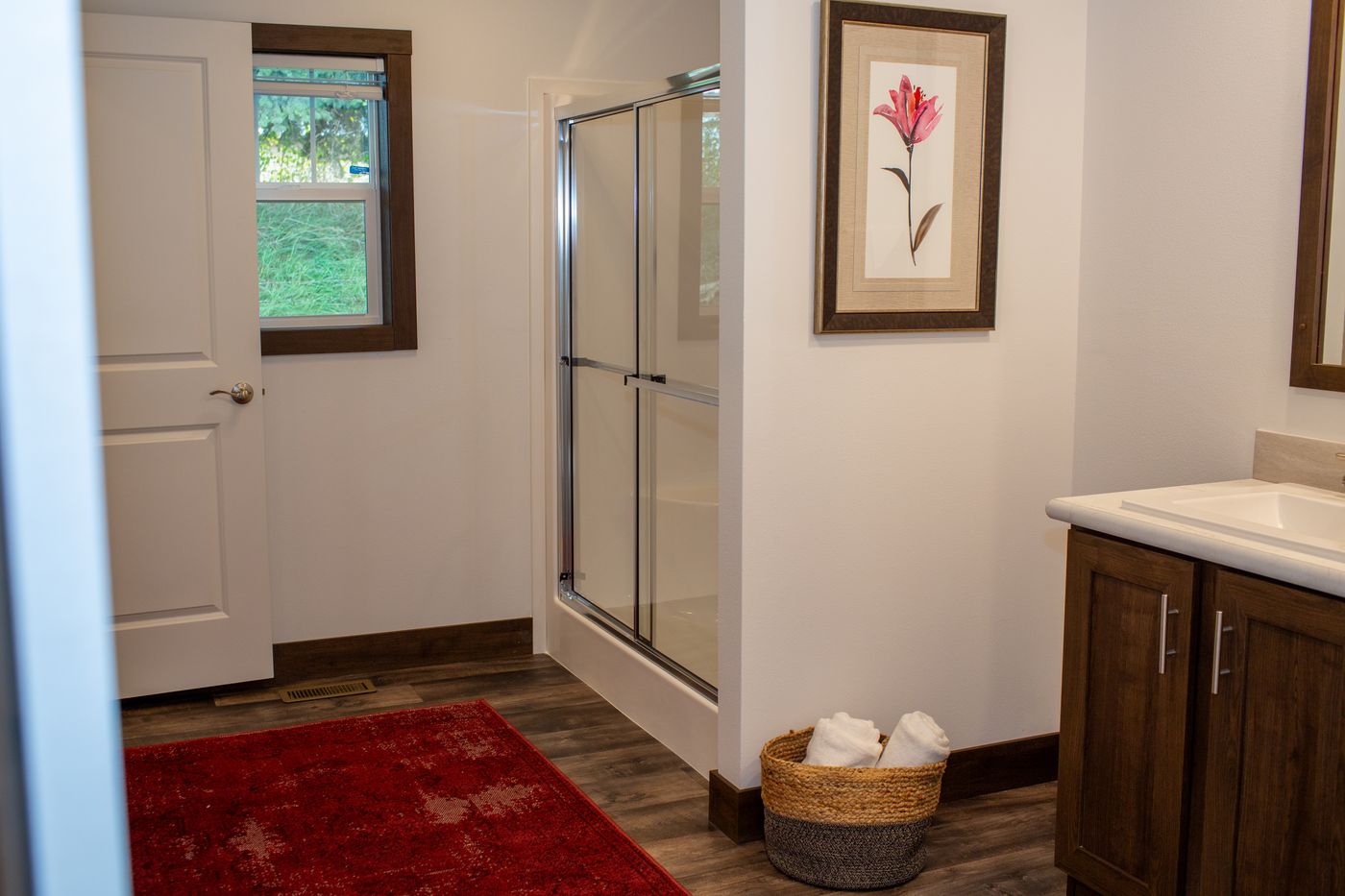 The RAMSEY 75 MOD Primary Bathroom. This Modular Home features 4 bedrooms and 2 baths.