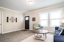 The CLASSIC 56D Living Room. This Manufactured Mobile Home features 3 bedrooms and 2 baths.