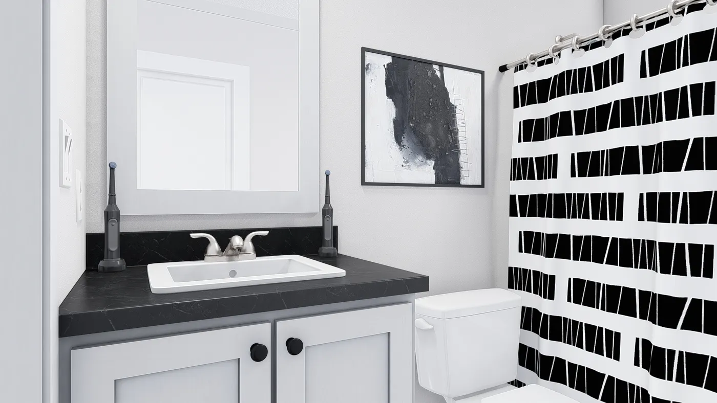 The JOHNNY B GOODE Guest Bathroom. This Manufactured Mobile Home features 3 bedrooms and 2 baths.