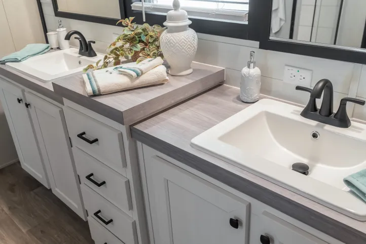The BREEZE FARMHOUSE Primary Bathroom. This Manufactured Mobile Home features 3 bedrooms and 2 baths.