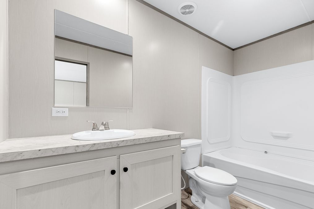 The BREEZE 16763A Master Bathroom. This Manufactured Mobile Home features 3 bedrooms and 2 baths.