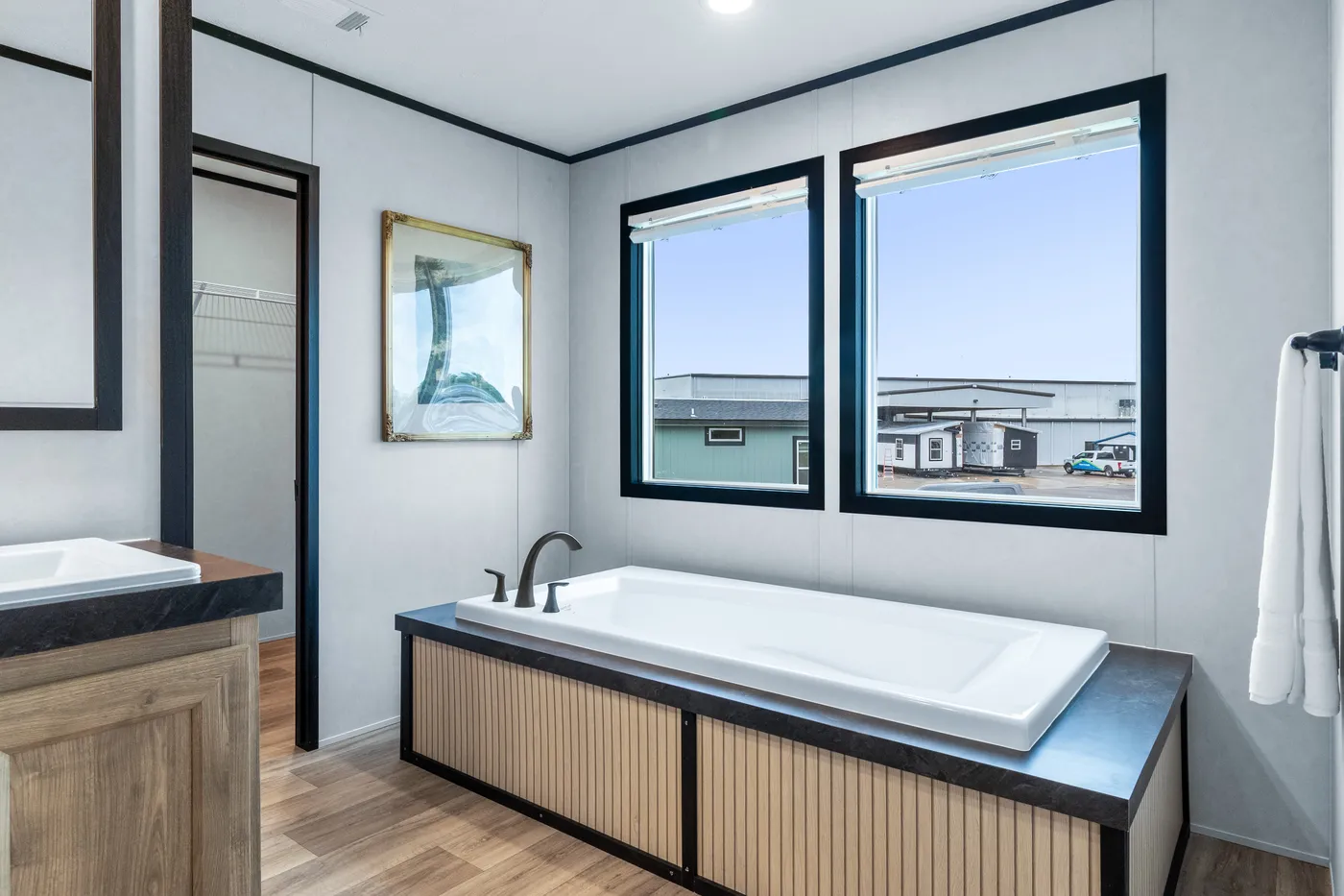 The ODYSSEY Primary Bathroom. This Manufactured Mobile Home features 4 bedrooms and 2 baths.