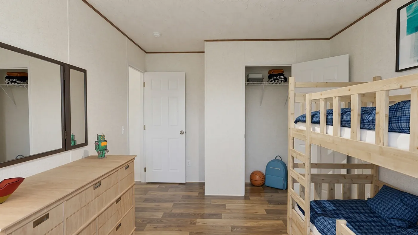 The MAPLE Guest Bedroom. This Manufactured Mobile Home features 3 bedrooms and 2 baths.