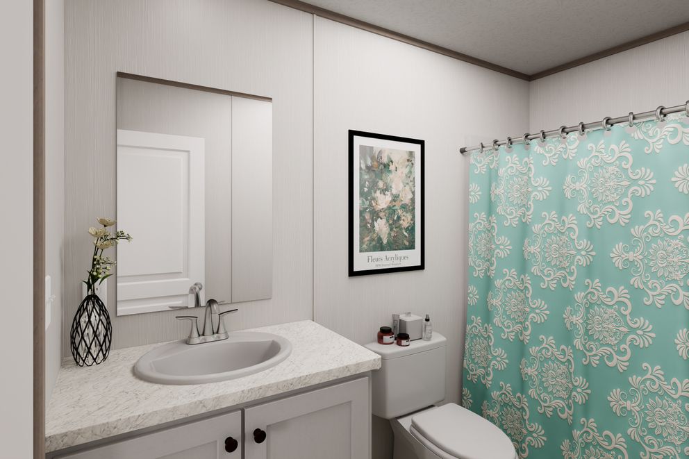 The ULTRA FLEX Guest Bathroom. This Manufactured Mobile Home features 3 bedrooms and 2 baths.