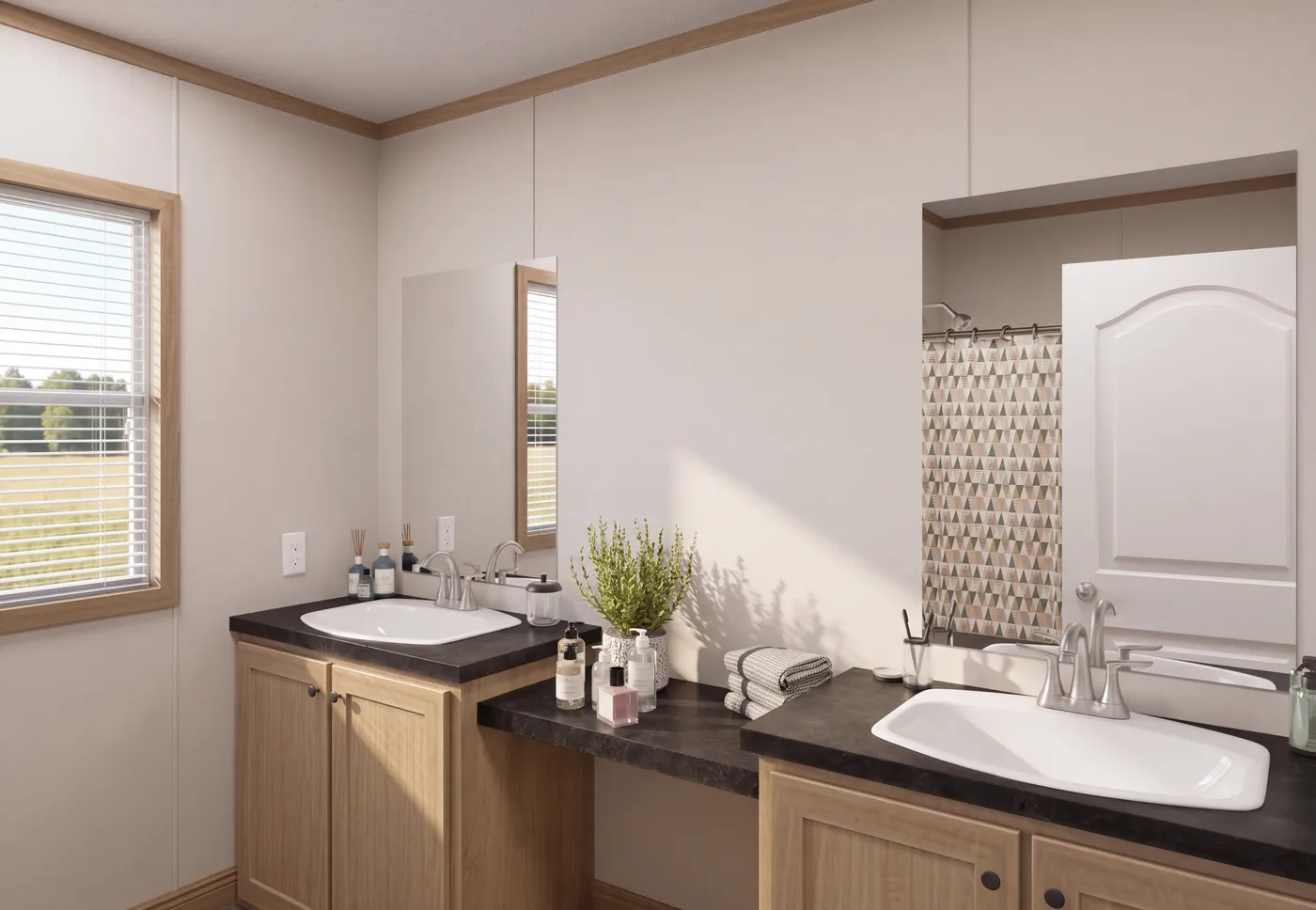 The THE MOUNTAINEER 72 Guest Bathroom. This Manufactured Mobile Home features 3 bedrooms and 2 baths.