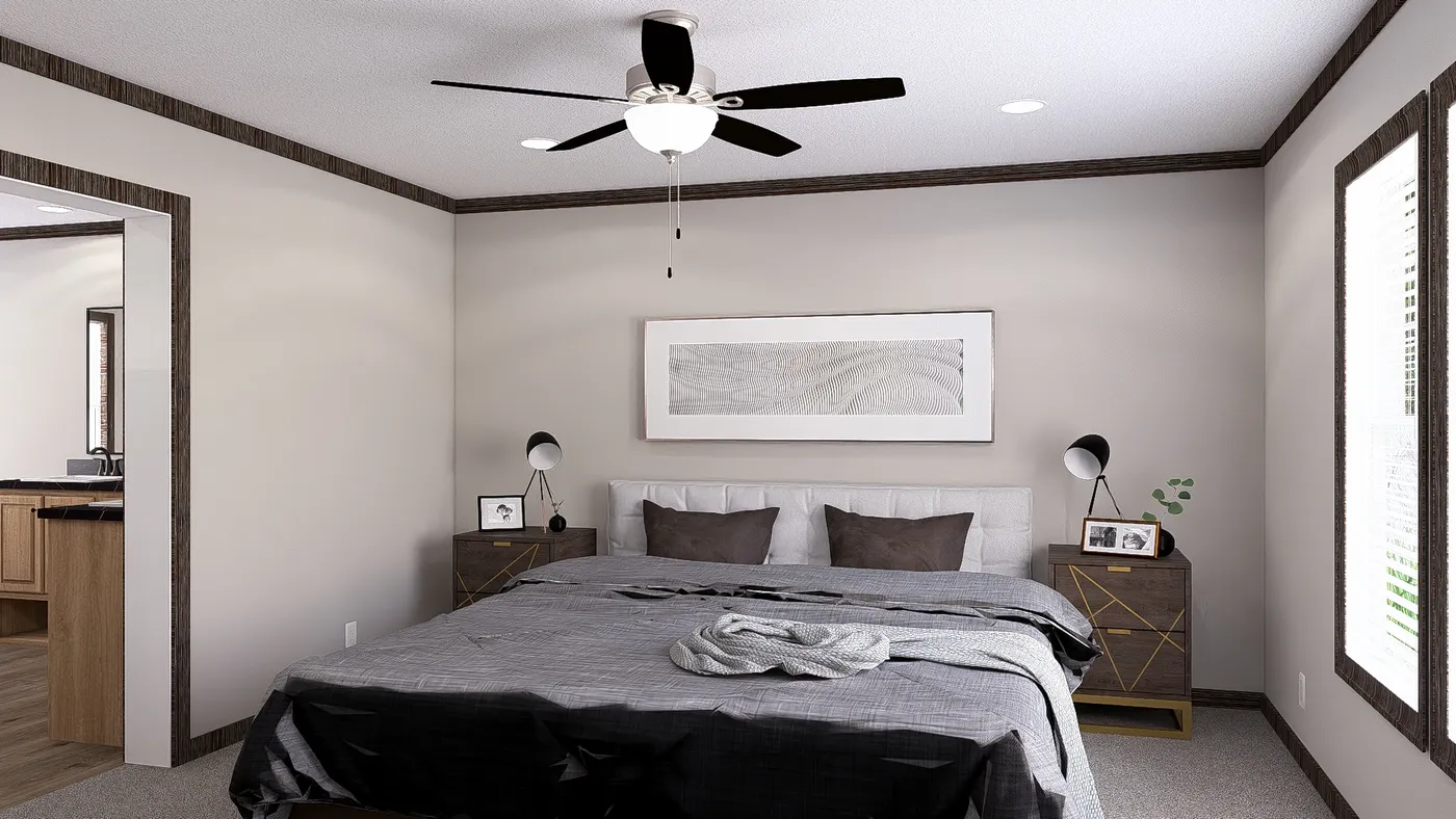 The THE JACKSON Primary Bedroom. This Manufactured Mobile Home features 4 bedrooms and 2 baths.