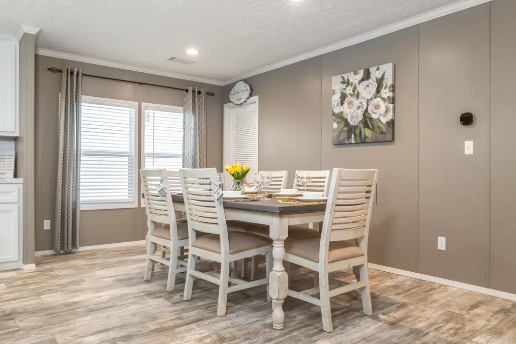 The CASCADE Dining Room. This Home features 4 bedrooms and 2 baths.