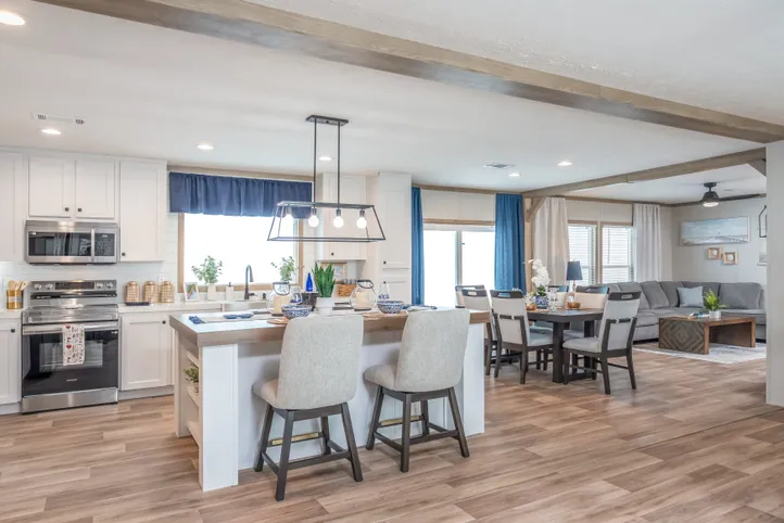 The EL SUENO BREEZE Kitchen. This Manufactured Mobile Home features 4 bedrooms and 2 baths.