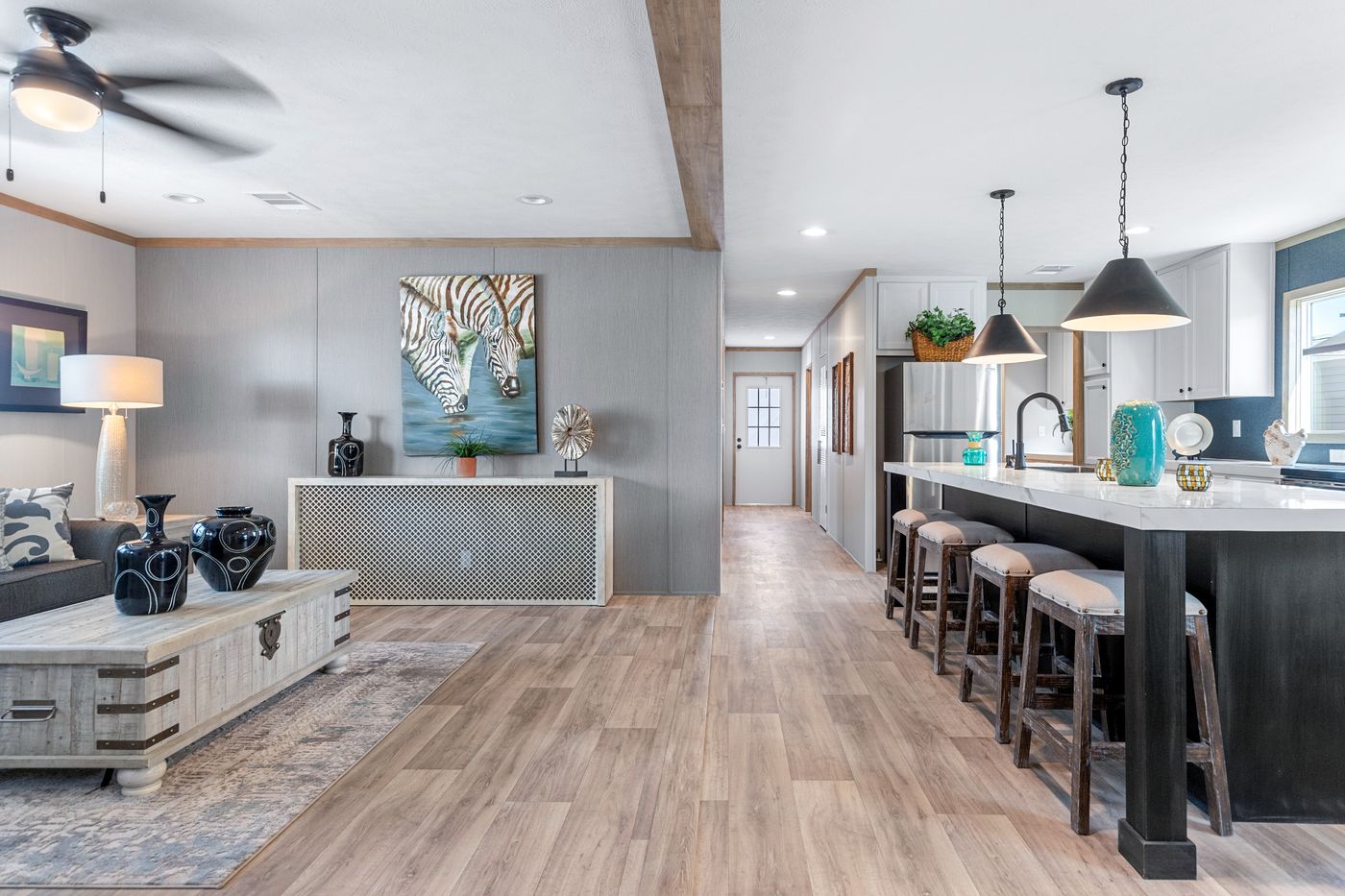 The ANATOLIA Living Room. This Manufactured Mobile Home features 3 bedrooms and 2 baths.