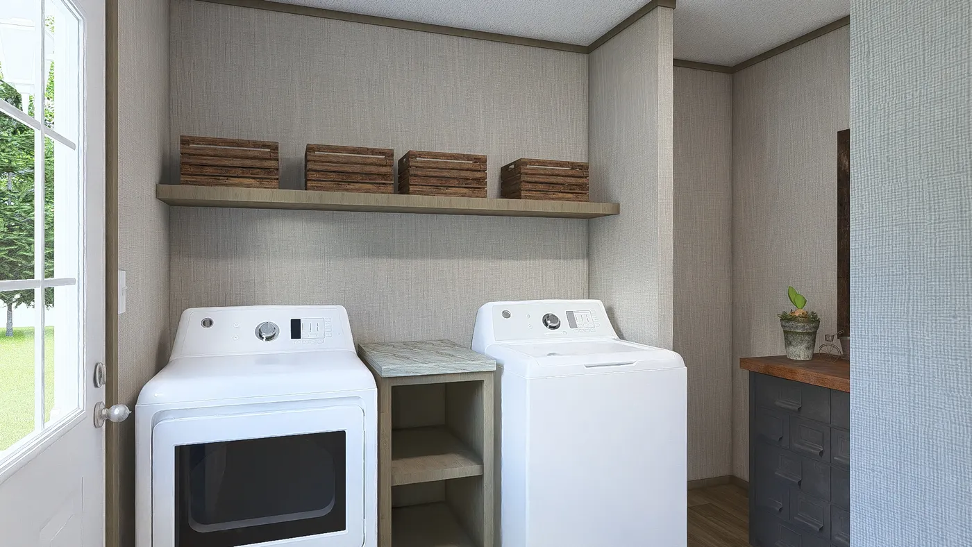 The EVEREST Utility Room. This Manufactured Mobile Home features 4 bedrooms and 2 baths.