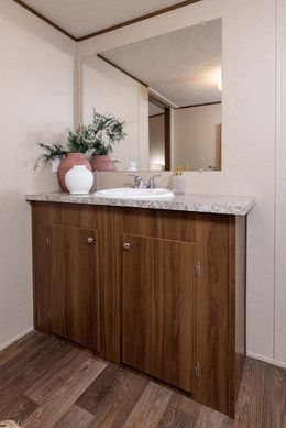 The PRIDE Primary Bathroom. This Manufactured Mobile Home features 4 bedrooms and 2 baths.