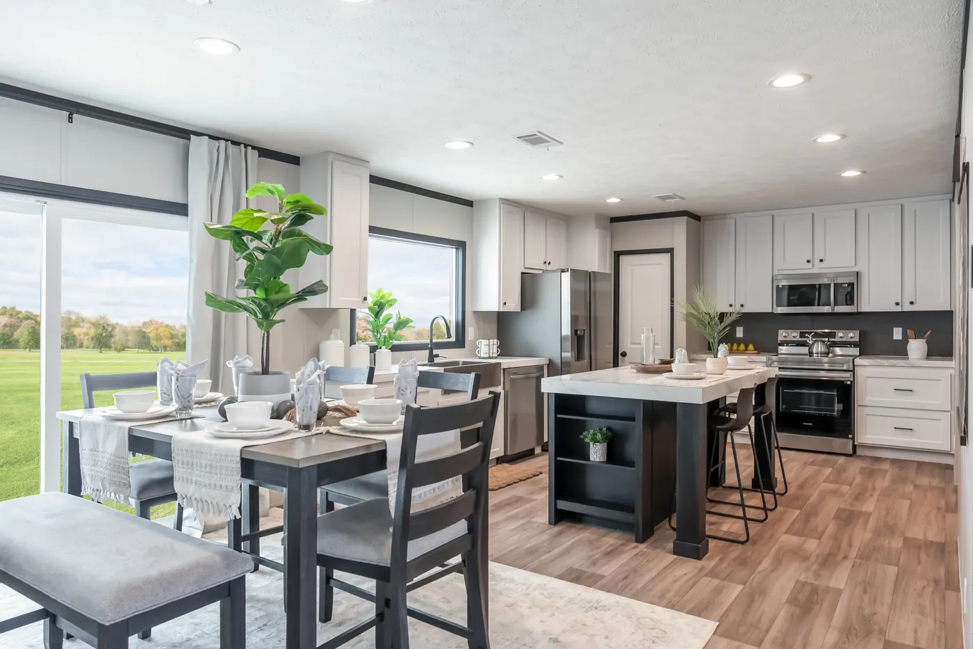 The THE ANNIVERSARY 2.1 Dining Area. This Manufactured Mobile Home features 3 bedrooms and 2 baths.