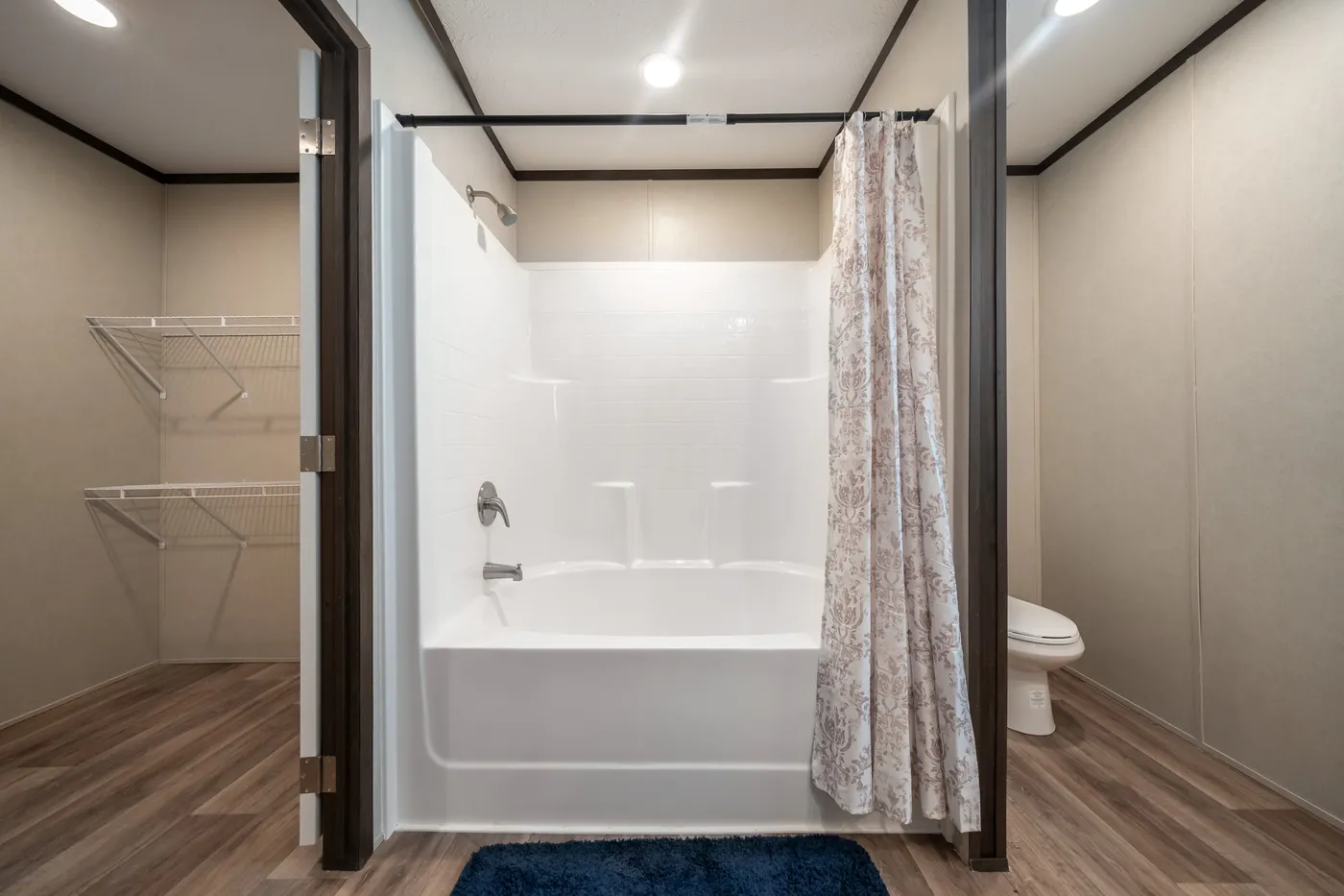 The ESSENCE Guest Bathroom. This Manufactured Mobile Home features 3 bedrooms and 2 baths.