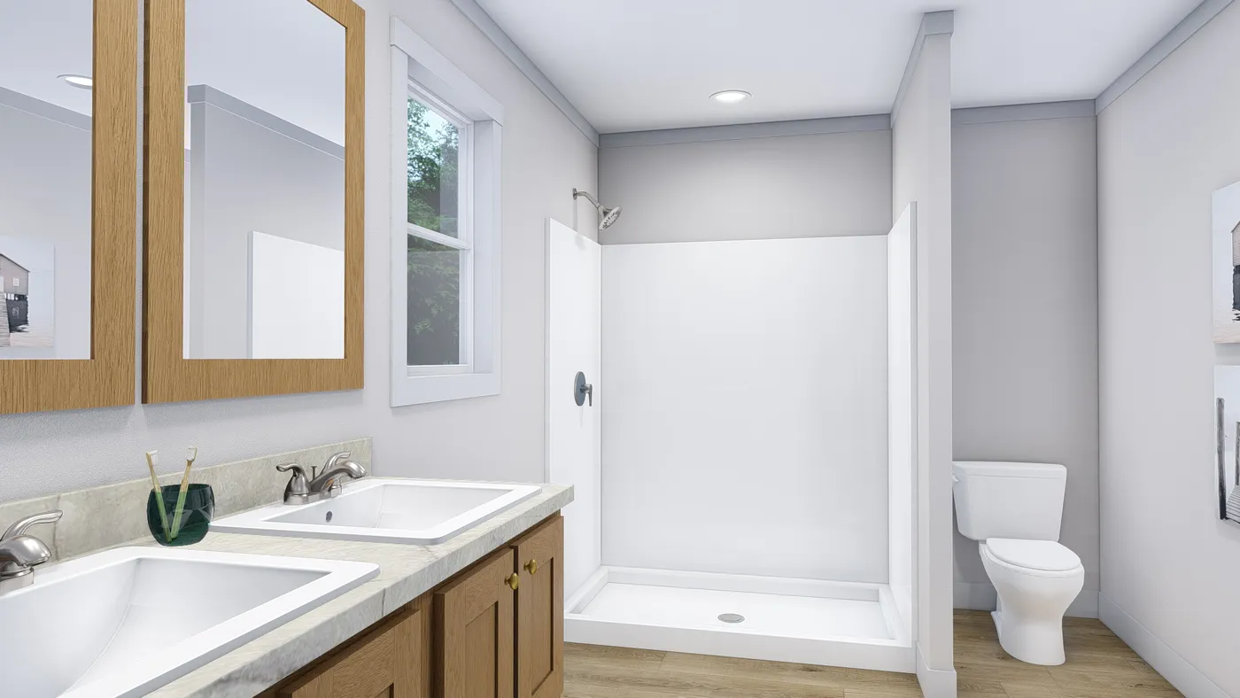 The LOVELY DAY Primary Bathroom. This Manufactured Mobile Home features 4 bedrooms and 2 baths.