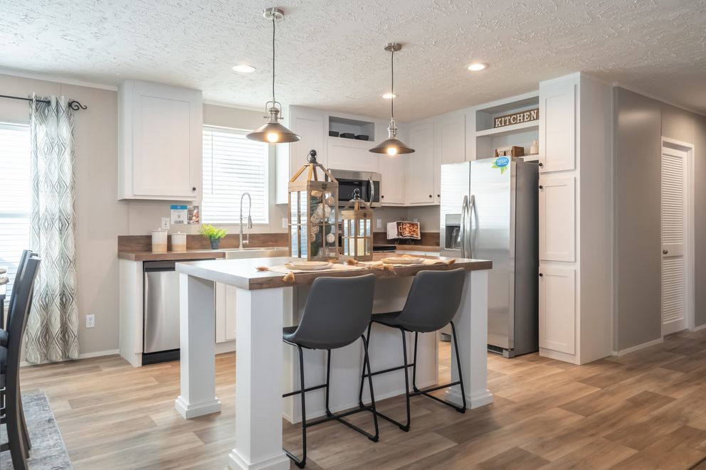 The TRADITION 2868B Kitchen. This Manufactured Mobile Home features 4 bedrooms and 2 baths.