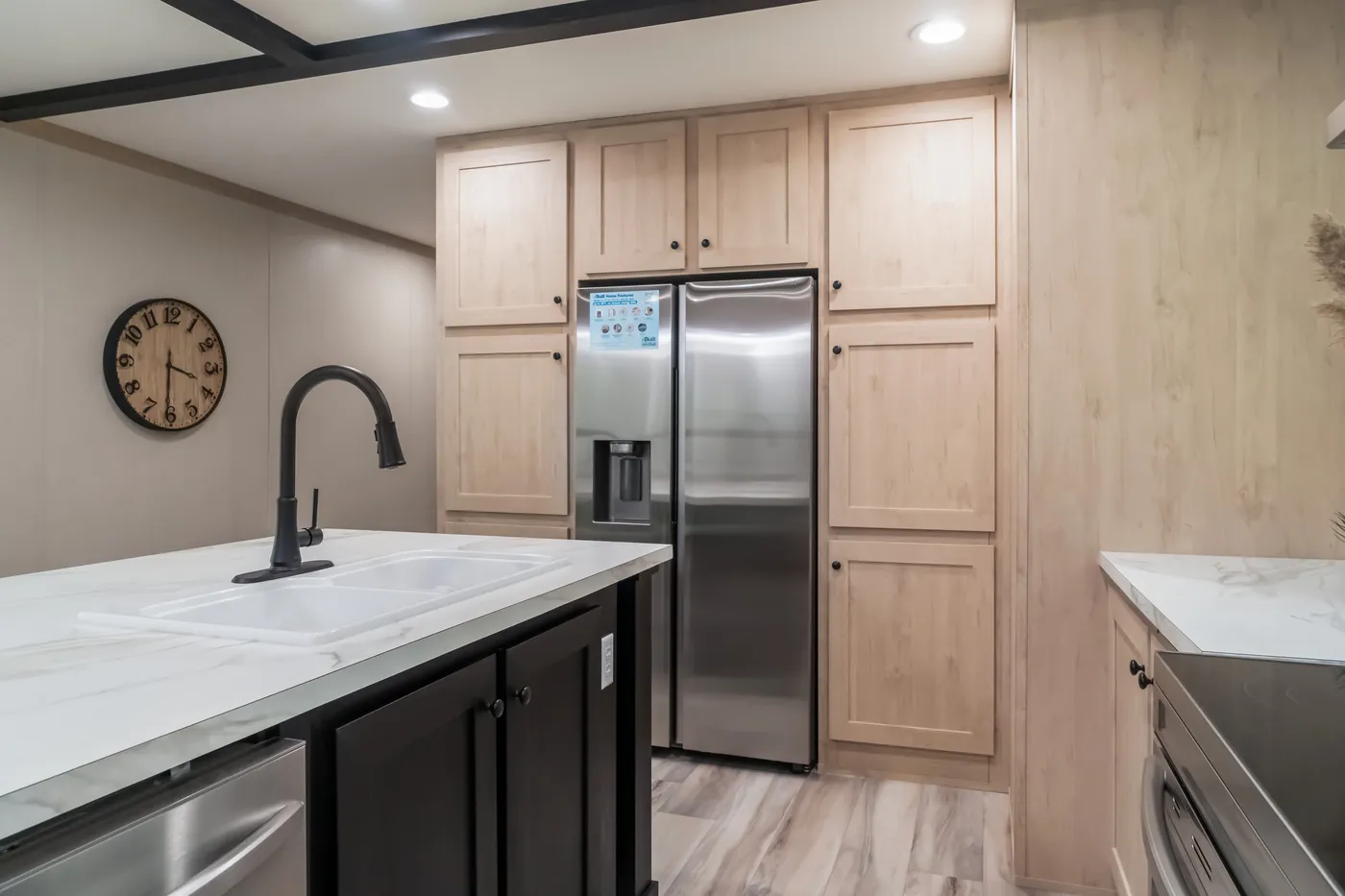 The ANNIVERSARY JEWEL Kitchen. This Manufactured Mobile Home features 3 bedrooms and 2 baths.