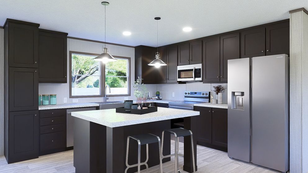 The ULTRA BREEZE 28X76 Kitchen. This Manufactured Mobile Home features 4 bedrooms and 2 baths.