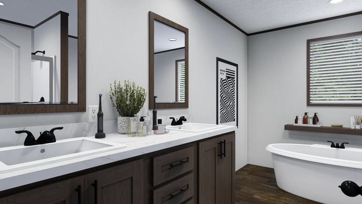 The BOLT Primary Bathroom. This Manufactured Mobile Home features 4 bedrooms and 2 baths.