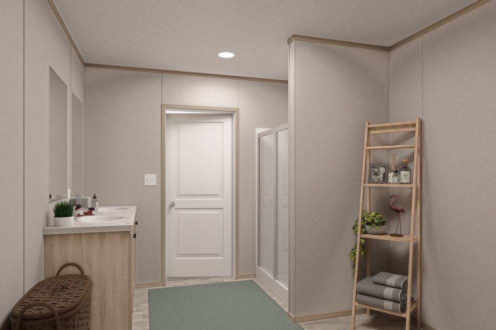 The THE EAGLE 68 Primary Bathroom. This Manufactured Mobile Home features 4 bedrooms and 2 baths.
