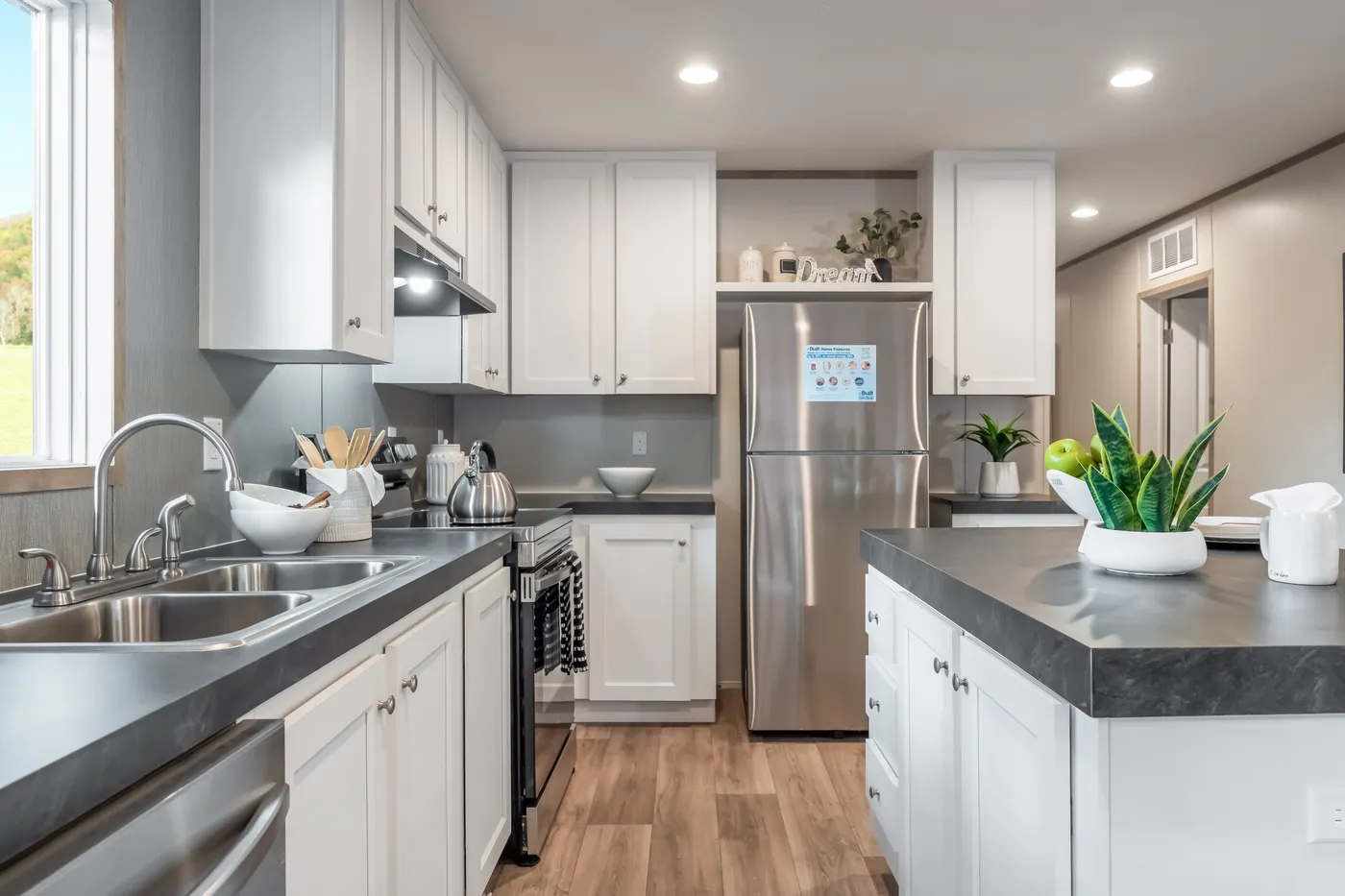 The ECLIPSE Kitchen. This Manufactured Mobile Home features 4 bedrooms and 2 baths.