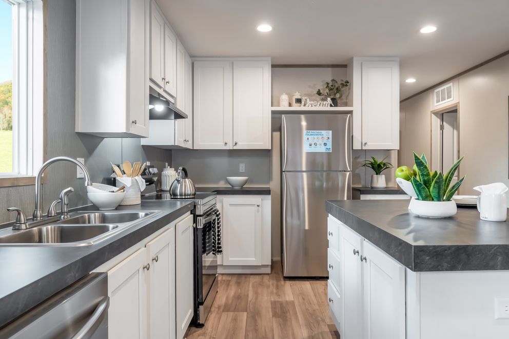 The ECLIPSE Kitchen. This Manufactured Mobile Home features 4 bedrooms and 2 baths.