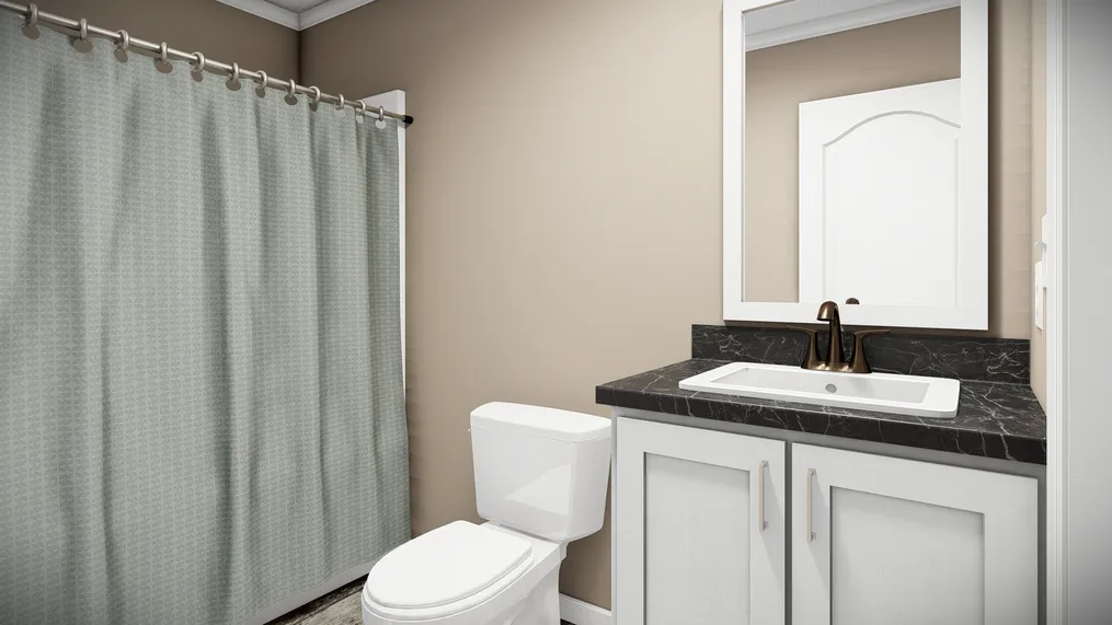 The THE MAVERICK Guest Bathroom. This Manufactured Mobile Home features 3 bedrooms and 2 baths.