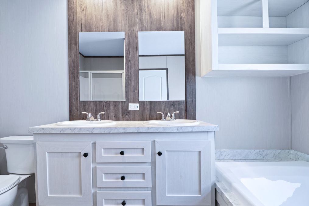 The ANNIVERSARY 16763S Master Bathroom. This Manufactured Mobile Home features 3 bedrooms and 2 baths.