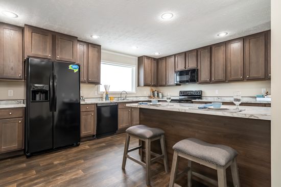 The MAVERICK 56A Kitchen. This Manufactured Mobile Home features 3 bedrooms and 2 baths.