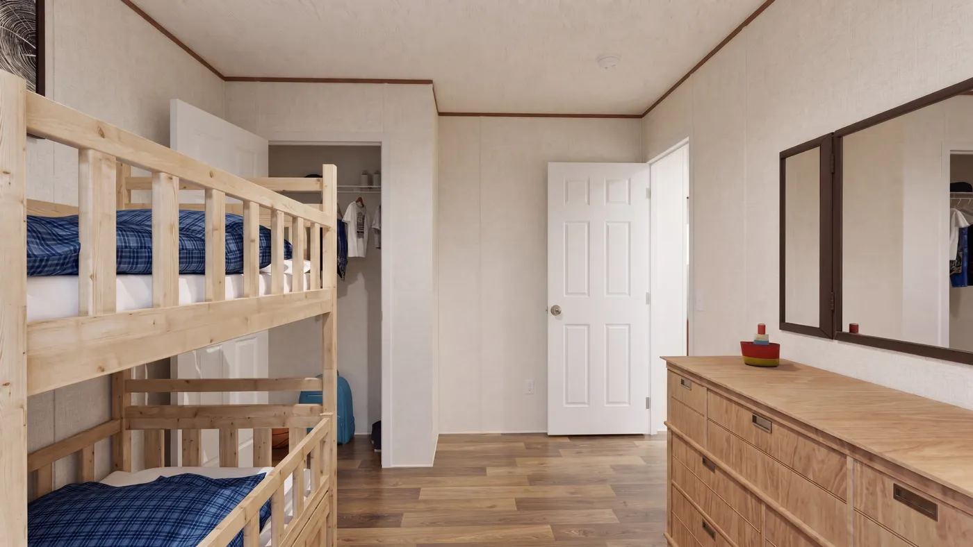 The CEDAR Guest Bedroom. This Manufactured Mobile Home features 3 bedrooms and 2 baths.