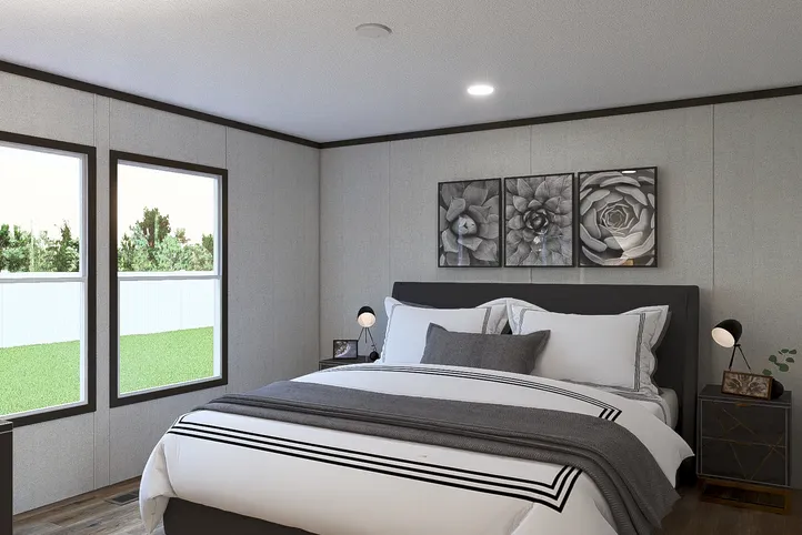 The REVEAL Primary Bedroom. This Manufactured Mobile Home features 3 bedrooms and 2 baths.