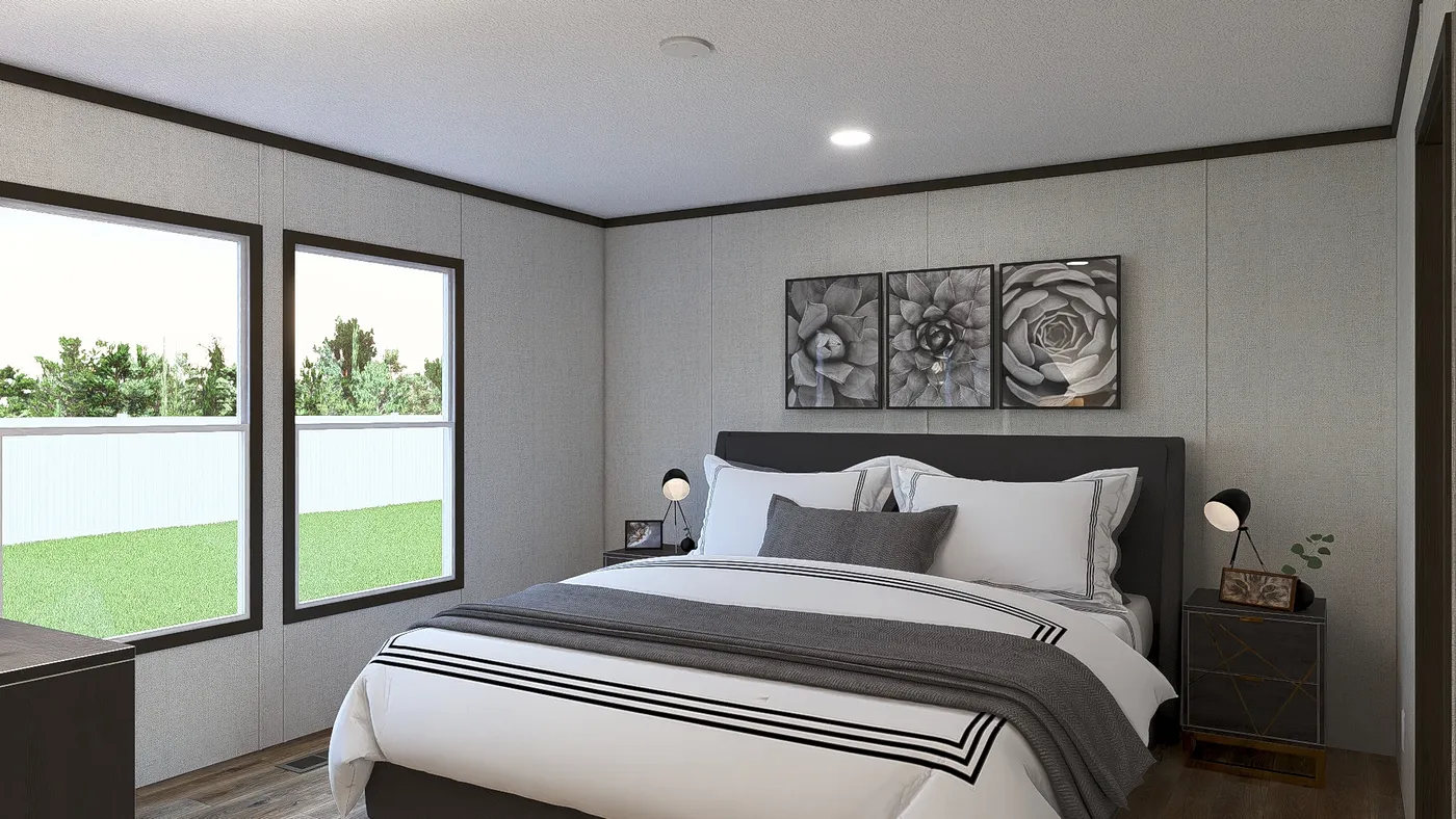 The REVEAL Primary Bedroom. This Manufactured Mobile Home features 3 bedrooms and 2 baths.