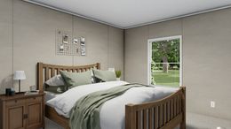 The ULTRA BREEZE 28X76 Primary Bedroom. This Manufactured Mobile Home features 4 bedrooms and 2 baths.