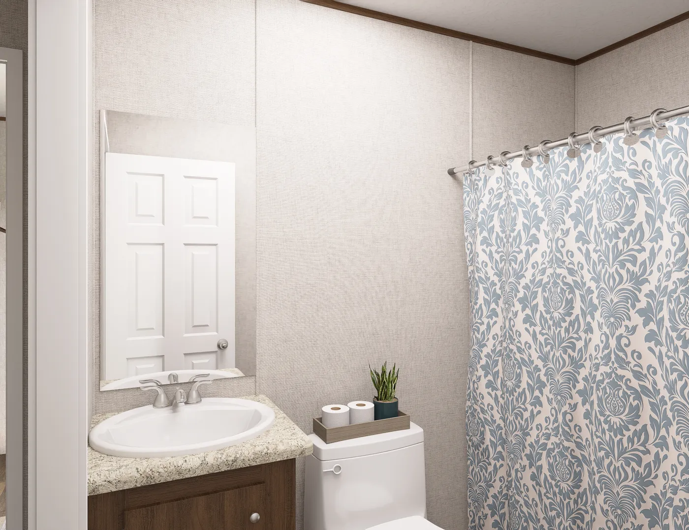 The BUTTERCUP Primary Bathroom. This Manufactured Mobile Home features 1 bedroom and 1 bath.